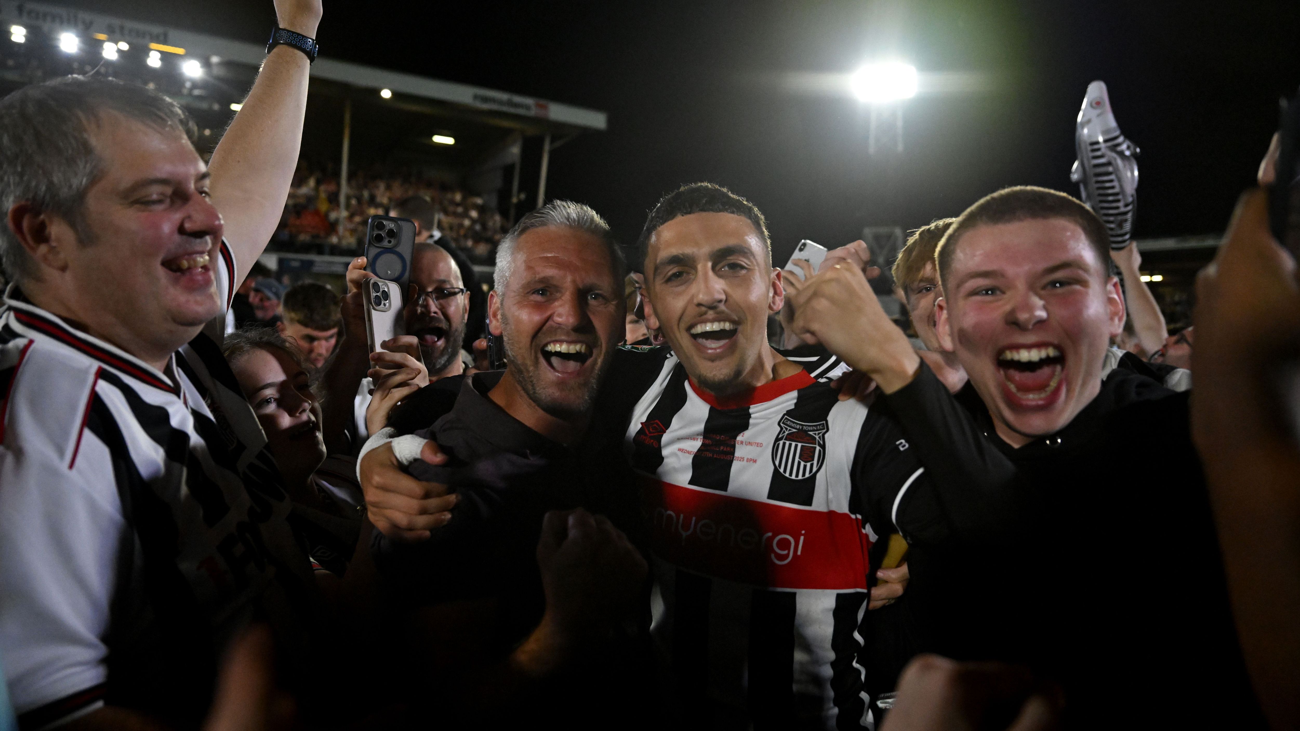 Grimsby Town Sanctioned for Fielding Ineligible Player Against Manchester United, Prompting Calls for Carabao Cup Rematch